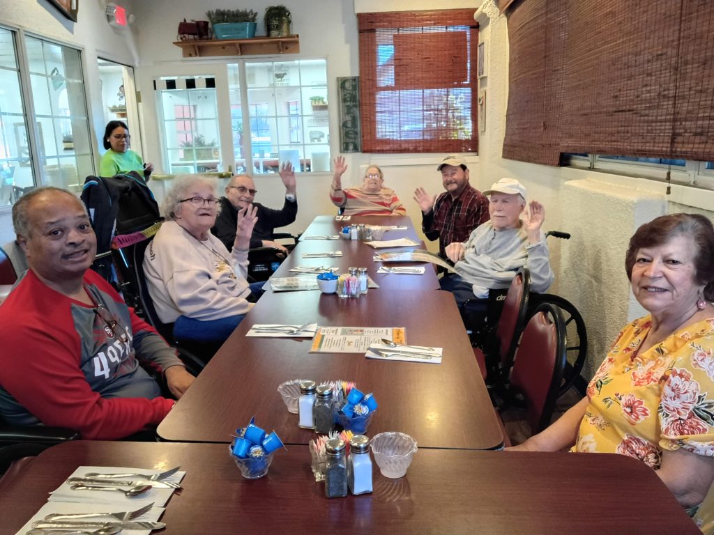 Residents participating in engaging activities at Sunnyside Senior Living assisted living community.